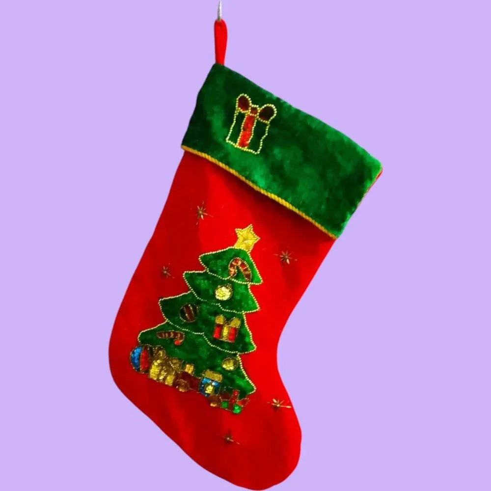 Oversized Christmas festive embellished holiday stocking in red, green and gold